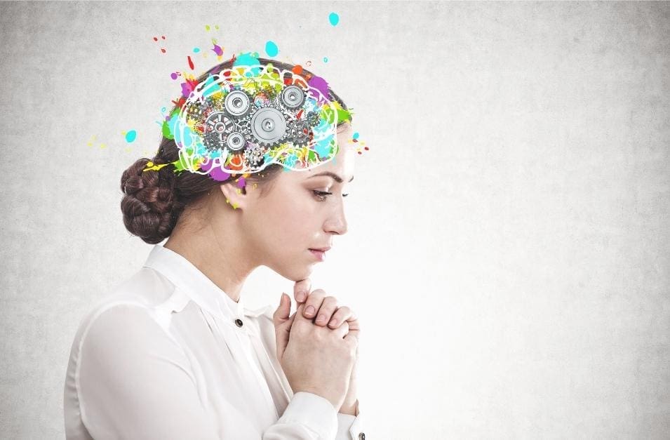 A young woman transforming her colorful brain, dismantling limiting beliefs step-by-step.